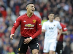 Manchester United's Alexis Sanchez reacts during the English Premier League soccer match between Manchester United and Wolverhampton Wanderers at Old Trafford stadium in Manchester, England, Saturday, Sept. 22, 2018.