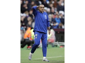 Chelsea head coach Maurizio Sarri stands on the touchline during the English Premier League soccer match between West Ham United and Chelsea at London Stadium in London, Sunday, Sept. 23, 2018.