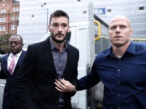 English soccer team Tottenham Hotspur's French goalkeeper Hugo Lloris arrives at Westminster magistrates court to answer a charge of a drinking and driving offense, in London, Wednesday, Sept. 12, 2018.