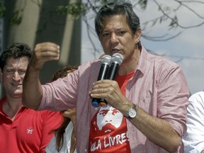 Brazil's presidential candidate for the Workers' Party Fernando Haddad speaks at a campaign rally, in Sao Paulo, Brazil, Wednesday, Sept. 19, 2018. Haddad has taken the place of barred former President Luiz Inacio Lula da Silva after the former president was barred from running because of a corruption conviction. Da Silva had been leading polls despite serving a prison sentence.