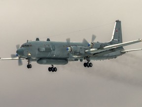 FILE In this file photo taken on Saturday, March 4, 2017, The Russian Il-20 electronic intelligence plane of the Russian air force with the registration number RF 93610, which was accidentally downed by Syrian forces responding to an Israeli air strike flays near Kubinka airport, outside Moscow, Russia. The Kremlin said that Russian President Vladimir Putin has accepted Israel's offer to share detailed information about the Israeli air raid that triggered the Syrian fire and led to the plane's loss.