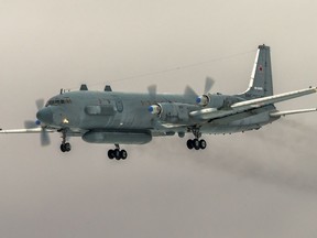 FILE- In this file photo taken on Saturday, March 4, 2017, The Russian Il-20 electronic intelligence plane of the Russian air force with the registration number RF 93610, which was accidentally downed by Syrian forces responding to an Israeli air strike flies near Kubinka airport, outside Moscow, Russia. The Russian Defense Ministry on Sunday Sept. 23, 2018, has renewed its accusations against Israel for causing the downing of a Russian military plane over Syria.
