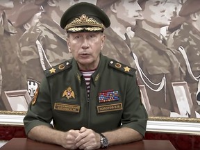 In this video grab taken from Rosguardia official website, National Guard chief Viktor Zolotov speaks as he records an emotional speech, posted on the National Guard's YouTube channel in Moscow, Russia, Tuesday, Sept. 11, 2018. President Vladimir Putin's former bodyguard and chief of the National Guard has challenged opposition leader Alexei Navalny to a duel. (Rosguardia Press Service via AP)