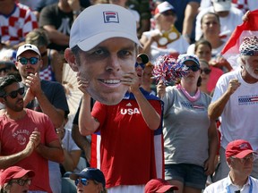 United States tennis fans support their team during a Davis Cup semifinal singles match between Croatia and the United States in Zadar, Croatia, Sunday, Sept. 16, 2018. Under a new format next year, the final phases of the competition will be held at a neutral site.