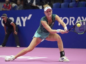 Alison Riske of the United States, returns a shot against Karolina Pliskova, of Czech Republic during the quarterfinal match of the Pan Pacific Open women's tennis tournament in Tokyo Friday, Sept. 21, 2018.