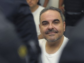 FILE - In this Aug. 8, 2018 file photo, El Salvador's former President Tony Saca attends an audience with a judge at the Isidro Menendez Judicial Complex in San Salvador, El Salvador, regarding charges of embezzling hundreds of millions of dollars in government funds in return for a lighter sentence. On Wednesday, Sept. 12, 2018, Saca was sentenced to 10 years in prison.