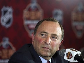 NHL Commissioner Gary Bettman attends a press conference before an NHL China Games hockey game between the Boston Bruins and the Calgary Flames in Shenzhen in southern China's Guangdong province, Saturday, Sept. 15, 2018. (Color China Photo via AP)