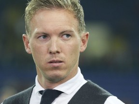 Hoffenheim coach Julian Nagelsmann looks on before the Group F Champions League soccer match between Shakhtar Donetsk and Hoffenheim at the Metalist Stadium in Kharkiv, Ukraine, Wednesday, Sept. 19, 2018.