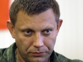 FILE - In this Sunday, Aug. 24, 2014 file photo, Alexander Zakharchenko, Prime Minister of the self-declared Donetsk People's Republic, is seen in Donetsk, Ukraine. The leader of the Russia-backed separatists fighting in eastern Ukraine's Donetsk region was killed Friday, Aug. 31, 2018 by an explosion at a cafe, the separatists' news agency said Friday. Rebel news agency DAN said the afternoon explosion killed Alexander Zakharchenko, 42, the prime minister of the self-declared Donetsk People's Republic.