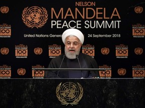 Iran's President Hassan Rouhani addresses the Nelson Mandela Peace Summit in the United Nations General Assembly, at U.N. headquarters, Monday, Sept. 24, 2018.