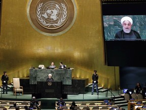 Iran's President Hassan Rouhani addresses the 73rd session of the United Nations General Assembly, at U.N. headquarters, Tuesday, Sept. 25, 2018.