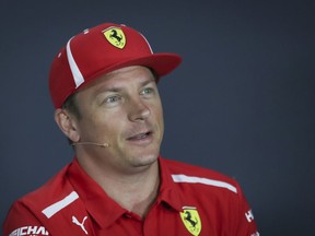 Ferrari driver Kimi Raikkonen of Finland speaks during a press conference at the Marina Bay City Circuit ahead of the Singapore Formula One Grand Prix in Singapore, Thursday, Sept. 13, 2018.