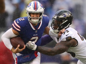 Terrell Suggs #55 of the Baltimore Ravens sacks quarterback Nathan Peterman #2 of the Buffalo Bills in the second quarter at M&T Bank Stadium on September 9, 2018 in Baltimore, Maryland.