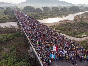 Aerial view of Honduran migrants heading to the U.S as the leave Arriaga on their way to San Pedro Tapanatepec, in southern Mexico on October 27, 2018.