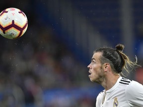 Real Madrid's Gareth Bale, goes for the ball during the Spanish La Liga soccer match between Real Madrid and Deportivo Alaves at Mendizorroza stadium, in Vitoria, northern Spain, Saturday, Oct. 6, 2018.