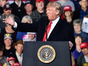 Donald Trump speaks during a "Make America Great" rally in Missoula, Montana, on October 18, 2018.