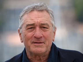 In this file photo taken on May 16, 2016 U.S. actor Robert de Niro poses during a photocall for the film "Hands of Stone" at the 69th Cannes Film Festival in Cannes, southern France.