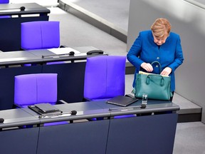 German chancellor Angela Merkel prepares on October 17, 2018, for a session of the German parliament in Berlin.