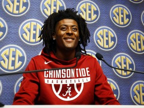 Alabama player John Petty speaks during the SEC men's NCAA college basketball media day, Wednesday, Oct. 17, 2018, in Birmingham, Ala.