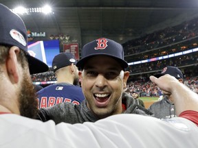 Boston Red Sox manager Alex Cora celebrates after they won the baseball American League Championship Series against the Houston Astros on Thursday, Oct. 18, 2018, in Houston. Red Sox won 4-1.