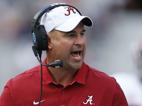 FILE - In this April 22, 2017, file photo, Alabama defensive coordinator Jeremy Pruitt, coach of the White team, yells to his team during Alabama's annual A-Day spring NCAA college football game in Tuscaloosa, Ala. Tennessee coach Jeremy Pruitt speaks from experience when he says this may be the best Alabama team of Nick Saban's 12-year tenure. Pruitt was part of Saban's staff for four national championship teams. Now he's a first-year head coach preparing to face the top-ranked Tide.