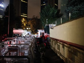 Turkish forensic officers arrive at the Saudi consulate to conduct a new search over the disappearance and alleged slaying of writer Jamal Khashoggi, in Istanbul, early Thursday, Oct. 18, 2018. Pro-government newspaper Yeni Safak on Wednesday said it had obtained audio recordings of the alleged killing of Saudi writer Khashoggi inside the consulate on Oct. 2.