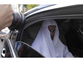 Saudi Arabia's top prosecutor Saud al-Mojeb leaves his country's consulate in Istanbul, Tuesday, Oct. 30, 2018. The Turkish fiancee of slain journalist Jamal Khashoggi has called on U.S. President Donald Trump and other leaders to ensure that his death in Istanbul is not covered up, while Saudi Arabia's top prosecutor on Tuesday visited the Saudi Consulate where officials from his government killed the writer.