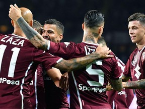 Torino's Tomas Rincon, third from left, face to the camera, celebrates  with his teammates after scoring during the Italian Serie A soccer match between Torino and Frosinone at  Calcio at the Olimpico Grande Torino  stadium in Turin, Italy,  Friday, Oct. 5, 2018.