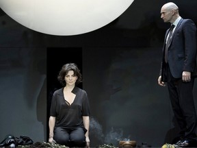 Juliette Binoche appears as Antigone and Patrick O’Kane as Creon in director Ivo Van Hove's 2015 production of Antigone.