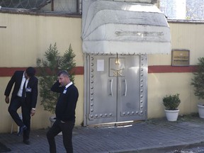 Security guards stand outside Saudi Arabia's consulate in Istanbul, Sunday, Oct. 28, 2018. Saudi Arabia's attorney general is scheduled to arrive in Turkey on Sunday to hold talks with investigators looking into the slaying of Saudi writer Jamal Khashoggi, who was killed in the kingdom's Istanbul consulate earlier this month.