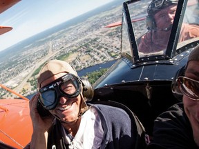 Touch the wind from the open cockpit of a vintage biplane with a flight over Ottawa taking off from the Canada Aviation and Space Museum.