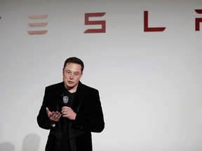 FILE - In this Sept. 29, 2015, file photo, Elon Musk, CEO of Tesla Motors Inc., talks about the Model X car at the company's headquarters, in Fremont, Calif. Electric auto brand Tesla Inc. says it has secured land in Shanghai for its first factory outside the United States, pushing ahead despite mounting U.S.-Chinese trade tensions. The company said it signed an agreement on a 210-acre (84-hectare) site.