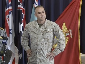 In this image made from video on April 23, 2018, U.S. Marine Col. James Schnelle, 48, speaks during an event in Darwin, Australia. The U.S. Marine Corps says Col. Schnelle, commander of more than 1,500 Marines in northern Australia, was relieved of his duties after police caught him driving under the influence of alcohol. (Australian Broadcasting Corporation via AP)