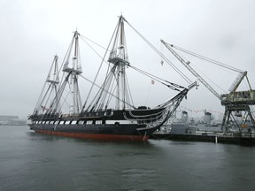 FILE - In this July 24, 2017, file photo, the USS Constitution, the world's oldest commissioned warship still afloat, is docked at the Charlestown Navy Yard in Boston. U.S. Interior Secretary Ryan Zinke is scheduled to announce on Friday, Oct. 5, 2018, a multimillion dollar project to refurbish the old Navy yard, home of Old Ironsides.