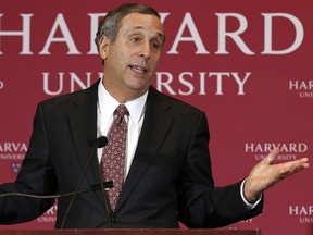 FILE - In this Feb. 11, 2018 file photo, Lawrence Bacow speaks after being introduced as the 29th president of Harvard University in Cambridge, Mass. Bacow will be inaugurated into the position on Friday, Oct. 5.