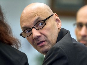 FILE - In this March 21, 2018 file photo, Andrew Urdiales looks into the courtroom gallery during opening statements in his trial in Santa Ana, Calif. He was later convicted of the murders of five Southern California women between 1986 and 1995. An Orange County Superior Court judge sentenced the 54-year-old former Marine to death Friday, Oct. 5, 2018. He was previously sentenced to death for killing three women in Illinois in 2002, but that sentence was commuted to life without parole after that state barred the death penalty.