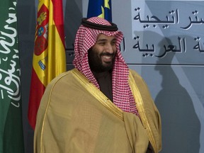 FILE - In this April 12, 2018, file photo, Saudi Crown Prince Mohammed bin Salman prepares to leave after a signing ceremony with Spain's Prime Minister Mariano Rajoy in Madrid, Spain. The killing of Saudi journalist Jamal Khashoggi at the kingdom's consulate in Istanbul on Oct. 2, 2018, is unlikely to halt Salman's rise to power, but could cause irreparable harm to relations with Western governments and businesses, potentially endangering his ambitious reform plans.