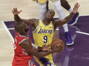 Los Angeles Lakers' Rajon Rondo (9) defends on Houston Rockets' Chris Paul during the first half of an NBA basketball game Saturday, Oct. 20, 2018, in Los Angeles.