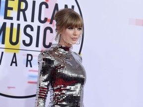 Taylor Swift arrives at the American Music Awards on Tuesday, Oct. 9, 2018, at the Microsoft Theater in Los Angeles.