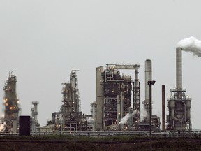 An oil refinery. To keep climate change predictable and manageable, the IPCC is essentially saying that by the time today's babies turn 30, most of these will have to be shut down.