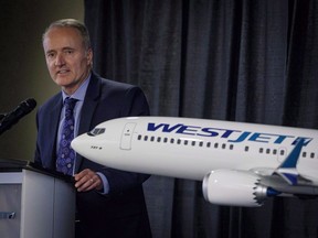 WestJet president and CEO Ed Sims addresses the airline's annual meeting in Calgary, Tuesday, May 8, 2018. Sims is to make a special announcement about WestJet's global future in Alberta.