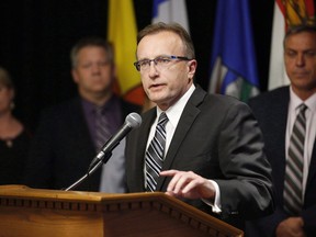 Jim Reiter, Saskatchewan Minister of Health responds to a reporter's question at a press conference during the Conferences of Provincial-Territorial Ministers of Health in Winnipeg, Thursday, June 28, 2018. The provincial government and the Pharmacy Association of Saskatchewan (PAS) have reached a new one-year agreement.