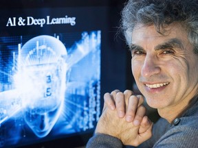 Computer Science professor Yoshua Bengio poses at his home in Montreal, Saturday, November 19, 2016.