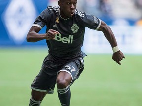 Vancouver Whitecaps' Alphonso Davies controls the ball during the first half of an MLS soccer game against FC Dallas in Vancouver, on Sunday September 23, 2018. It's the end of an era for Davies on Sunday. The 17-year-old Canadian international will play his final game for the Vancouver Whitecaps before heading to German powerhouse Bayern Munich, which acquired Davies in a record-setting transfear deal.