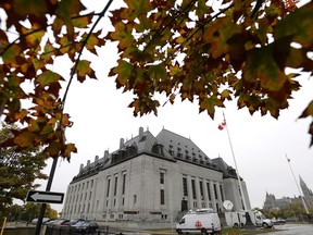 The Supreme Court of Canada is seen in Ottawa on Thursday, Oct. 11, 2018. The Supreme Court of Canada says it will hear a legal dispute over whether the Ontario government can force Weyerhaeuser Co. and Resolute Forest Products to clean up mercury contamination near the Grassy Narrows First Nation.