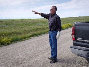 Former Blood Tribe Chief Harley Frank gestures from his truck on disputed land near his home near Spring Coulee, Alta. Thursday, July 5, 2018. A federal judge has ordered that a land dispute between two families on Canada's largest First Nation go back to square one.