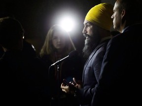 NDP Leader Jagmeet Singh speaks during a press conference on Parliament Hill in Ottawa on October 15, 2018. NDP Leader Jagmeet Singh is calling on the federal government to pick up the tab to continue a basic income pilot project scrapped by Ontario Premier Doug Ford. The $150-million, three-year project was initiated by the province's previous Liberal government but Ford announced last summer that his Conservative government will end the project in March, a year ahead of schedule.