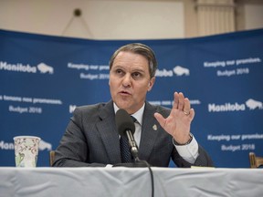 Manitoba Finance Minister Cameron Friesen speaks at the Manitoba Legislature in Winnipeg on March 12, 2018. Manitoba's health minister says there is clear evidence that people with addictions issues are migrating to methamphetamine. Cameron Friesen says meth use has increased significantly, creating a complex problem that has the government's full attention.