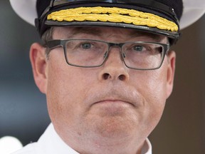 Vice-Admiral Mark Norman speaks with reporters following an appearance at court in Ottawa on September 4, 2018. Vice-Admiral Mark Norman's legal team is demanding the federal government release dozens of documents that officials have deemed cabinet secrets, but which Norman's lawyers say they need to properly defend their client in court. The request is detailed in a court filing from Norman's lawyers obtained by