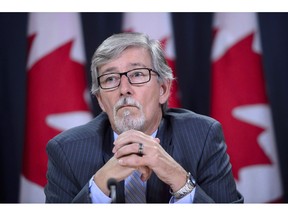 Privacy Commissioner Daniel Therrien holds a news conference to discuss his annual report in Ottawa on Thursday, Sept. 27, 2018. After more than three years of legislative fine-tuning, Canadian businesses will be required as of Thursday to alert their customers and the federal privacy watchdog if there's a danger that personal information under an organization's control has fallen into the wrong hands.